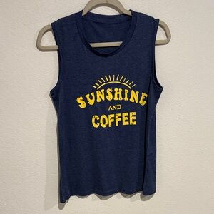 5 for $10 Small Navy Blue Graphic Tank Top sunshine and coffee can fit a medium.